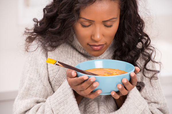 Woman holding soup